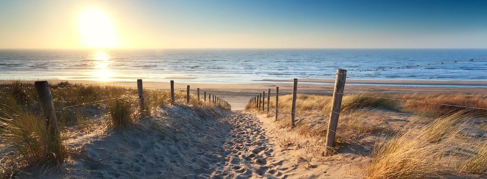 Boekjebungalow_vakantiepark_Hof_Domburg_strand_zonsondergang.jpg